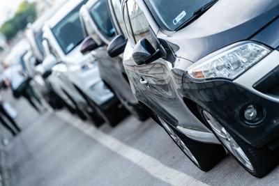 Many cars travelling on a road-stock-photo