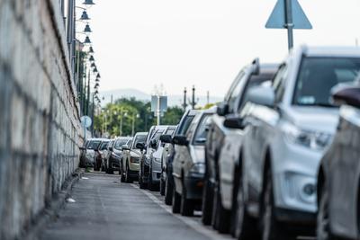 Many cars travelling on a road-stock-photo