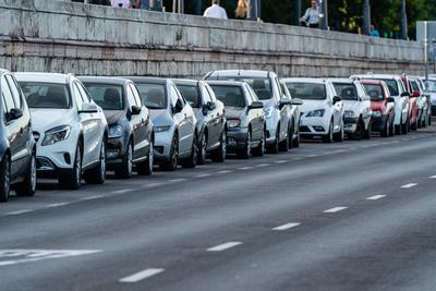 Many cars travelling on a road-stock-photo