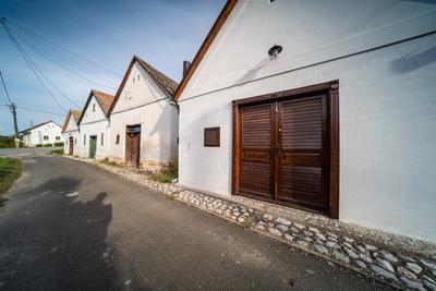 Wine cellars in a row in Southern Hungary in Palkonya village-stock-foto
