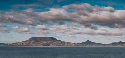 Lake Balaton with Badacsony hill and cloudy sky-stock-foto
