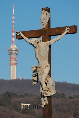 jesus christ ascension on cross with Tv tower-stock-photo