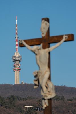 jesus christ ascension on cross with Tv tower-stock-photo