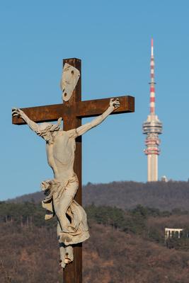 jesus christ ascension on cross with Tv tower-stock-photo