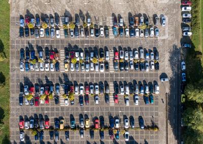 Aerial drone view above cars at parking-stock-foto