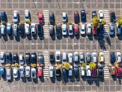 Aerial drone view above cars at parking-stock-foto