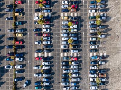 Aerial drone view above cars at parking-stock-foto
