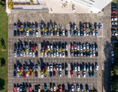 Aerial drone view above cars at parking-stock-foto