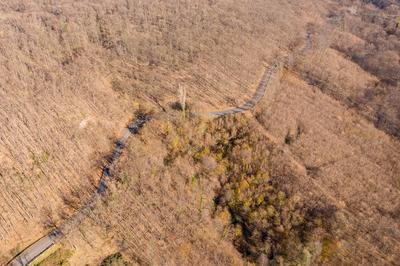 Aerial drone view from a cury road in mecsek-stock-foto