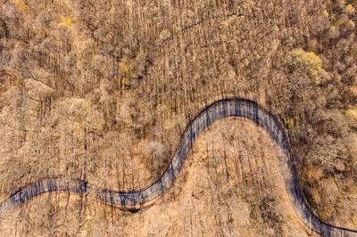 Aerial drone view from a cury road in mecsek-stock-foto