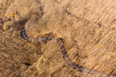 Aerial drone view from a cury road in mecsek-stock-foto
