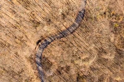 Aerial drone view from a cury road in mecsek-stock-photo