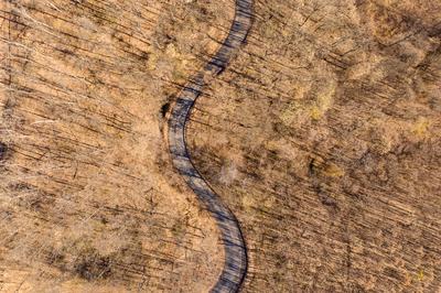 Aerial drone view from a cury road in mecsek-stock-foto