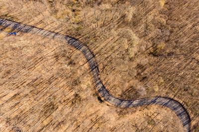 Aerial drone view from a cury road in mecsek-stock-photo