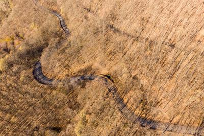 Aerial drone view from a cury road in mecsek-stock-foto