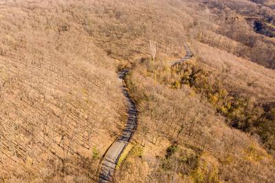 Aerial drone view from a cury road in mecsek-stock-foto