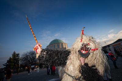 MOHACS, HUNGARY - FEBRUARY 14: Unidentified person wearing mask for spring greetings. In this year during the COVID pandemic the public Busojaras event was cancelled. February 14, 2021 in Mohacs, Hungary.-stock-photo