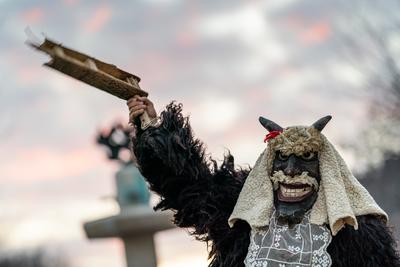 MOHACS, HUNGARY - FEBRUARY 16: Unidentified person wearing mask in Busojaras. In this year during the COVID pandemic the public Busojaras event was cancelled. February 16, 2021 in Mohacs, Hungary.-stock-photo