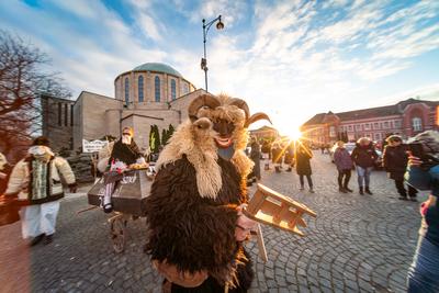 MOHACS, HUNGARY - FEBRUARY 16: Unidentified person wearing mask in Busojaras. In this year during the COVID pandemic the public Busojaras event was cancelled. February 16, 2021 in Mohacs, Hungary.-stock-photo