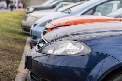 many parking cars in an outdoor garage-stock-photo