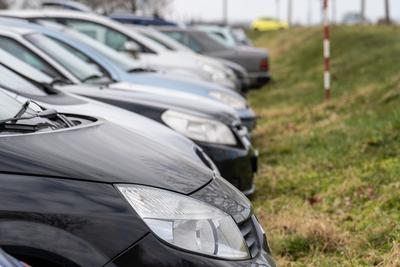 many parking cars in an outdoor garage-stock-photo