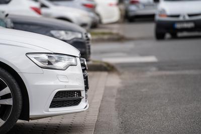 many parking cars in an outdoor garage-stock-photo