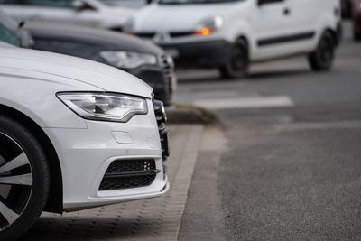 many parking cars in an outdoor garage-stock-photo