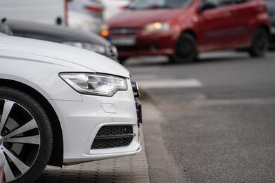 many parking cars in an outdoor garage-stock-photo