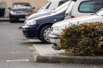 many parking cars in an outdoor garage-stock-photo