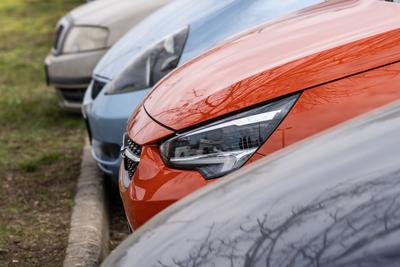 many parking cars in an outdoor garage-stock-photo