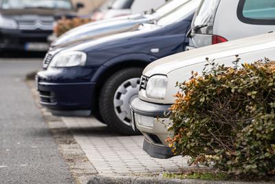 many parking cars in an outdoor garage-stock-photo