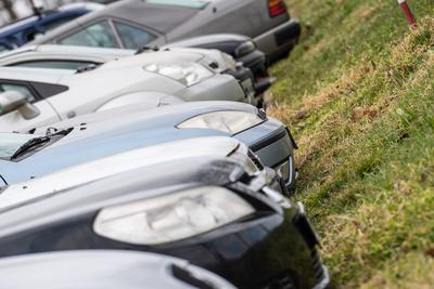 many parking cars in an outdoor garage-stock-photo