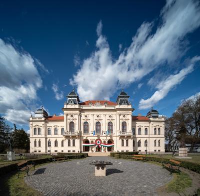 Town hall in Kisujszallas with march 15 decoriation-stock-photo