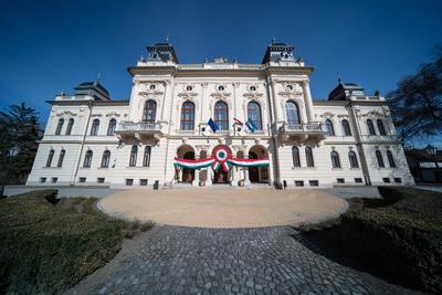 Town hall in Kisujszallas with march 15 decoriation-stock-photo
