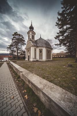 Small chapel with stormy clouds, before rain-stock-foto