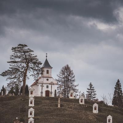 Small chapel with stormy clouds, before rain-stock-foto