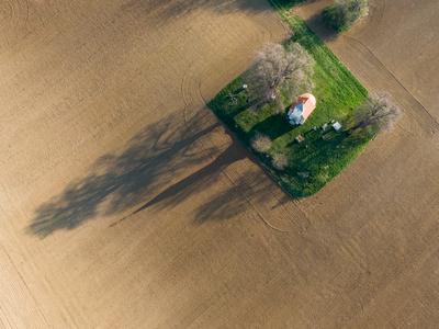 aerial photo of a small chapel with morning sunshine-stock-foto