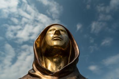 Budapest, Hungary -August 7, .2022:  Portrait of the statue of Satoshi Nakamoto mysterious founder of Bitcoin and Blockchain technology in; created by Reka Gergely and Tamas Gilly.  August 7, .2022 in Budapest, Hungary.-stock-photo