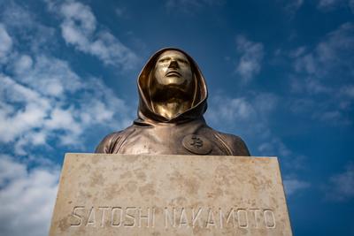 Budapest, Hungary -August 7, .2022:  Portrait of the statue of Satoshi Nakamoto mysterious founder of Bitcoin and Blockchain technology in; created by Reka Gergely and Tamas Gilly.  August 7, .2022 in Budapest, Hungary.-stock-photo