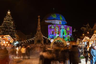 PECS, HUNGARY - DECEMBER 4 2022: Advent market with christmas tree at Szechenyi Square in Pecs. December 4, 2022 Pecs, Hungary-stock-photo