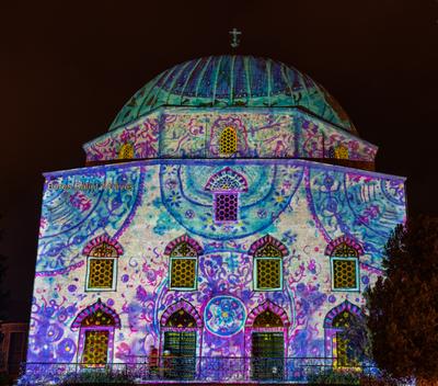 PECS, HUNGARY - DECEMBER 2 2022: Christmas color painting on Dzsami at Szechenyi Square in Pecs. December 2, 2022 Pecs, Hungary-stock-photo