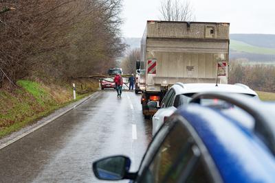 BOSZENFA, HUNGARY - JANUARY 10 2023: Fallen tree blocked the road and   caused congestion on the road Boszenfa. January 10 2023 Boszenfa, Hungary-stock-photo