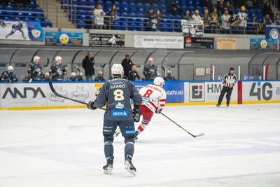 BUDAPEST - FEBRUARY 2: MAC Budapest (Budapest Jégkorong Akadémia Hockey Club) (blue) and Gyergyoi HK  (white) ice hockey teams participate in Championship, February 2, 2024 in Budapest, Hungary.-stock-photo