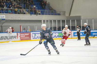 BUDAPEST - FEBRUARY 2: MAC Budapest (Budapest Jégkorong Akadémia Hockey Club) (blue) and Gyergyoi HK  (white) ice hockey teams participate in Championship, February 2, 2024 in Budapest, Hungary.-stock-photo