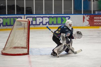 BUDAPEST - FEBRUARY 2: MAC Budapest (Budapest Jégkorong Akadémia Hockey Club) (blue) and Gyergyoi HK  (white) ice hockey teams participate in Championship, February 2, 2024 in Budapest, Hungary.-stock-photo