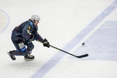 BUDAPEST - FEBRUARY 2: MAC Budapest (Budapest Jégkorong Akadémia Hockey Club) (blue) and Gyergyoi HK  (white) ice hockey teams participate in Championship, February 2, 2024 in Budapest, Hungary.-stock-photo