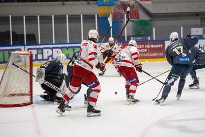 BUDAPEST - FEBRUARY 2: MAC Budapest (Budapest Jégkorong Akadémia Hockey Club) (blue) and Gyergyoi HK  (white) ice hockey teams participate in Championship, February 2, 2024 in Budapest, Hungary.-stock-photo