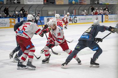 BUDAPEST - FEBRUARY 2: MAC Budapest (Budapest Jégkorong Akadémia Hockey Club) (blue) and Gyergyoi HK  (white) ice hockey teams participate in Championship, February 2, 2024 in Budapest, Hungary.-stock-photo