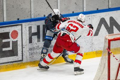 BUDAPEST - FEBRUARY 2: MAC Budapest (Budapest Jégkorong Akadémia Hockey Club) (blue) and Gyergyoi HK  (white) ice hockey teams participate in Championship, February 2, 2024 in Budapest, Hungary.-stock-photo