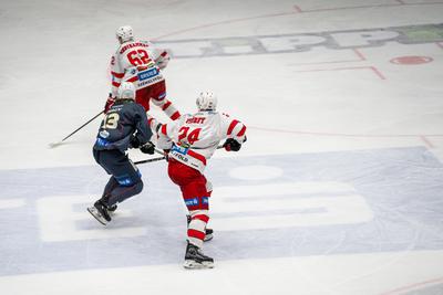 BUDAPEST - FEBRUARY 2: MAC Budapest (Budapest Jégkorong Akadémia Hockey Club) (blue) and Gyergyoi HK  (white) ice hockey teams participate in Championship, February 2, 2024 in Budapest, Hungary.-stock-photo